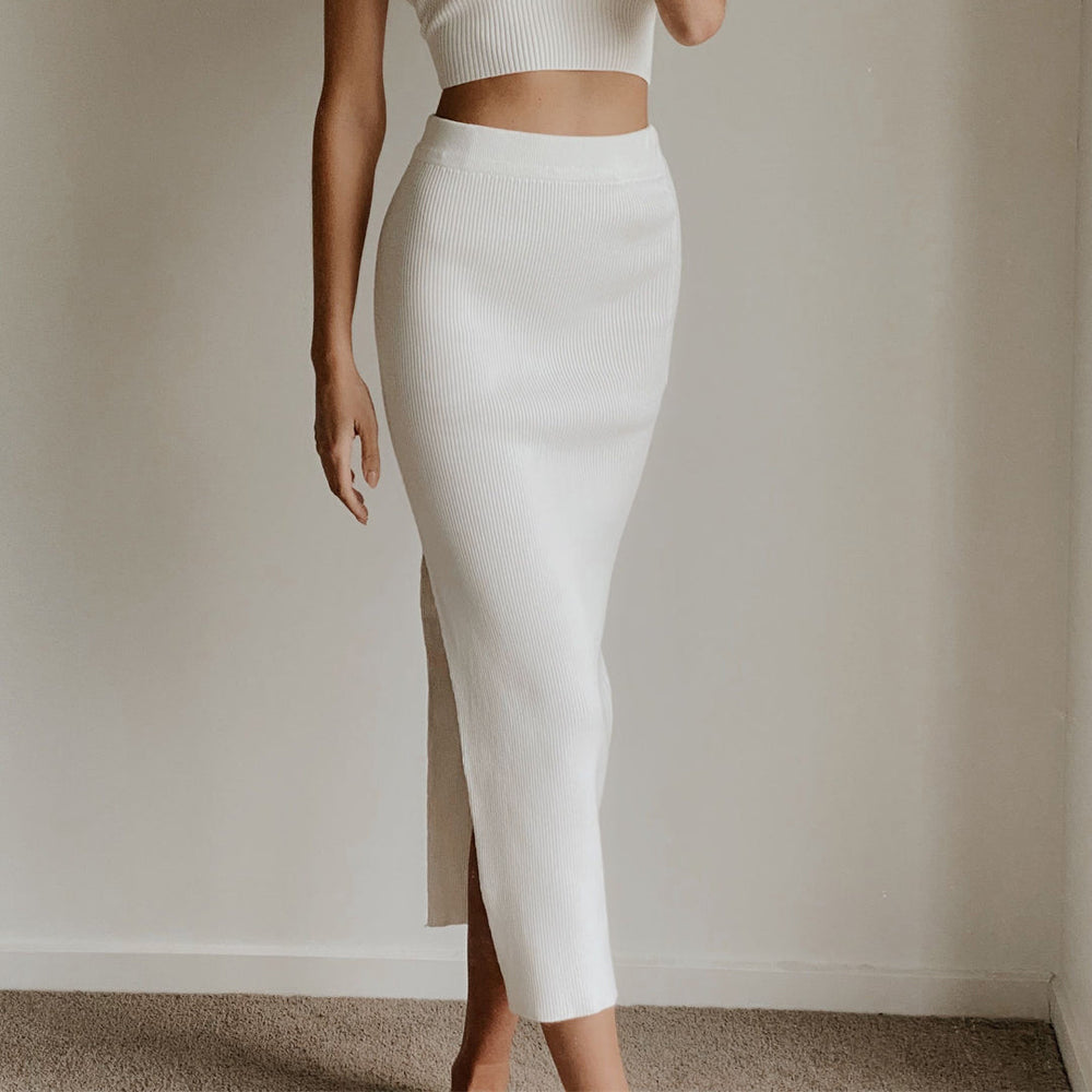 Female model wearing white knit high waist bodycon midi skirt online